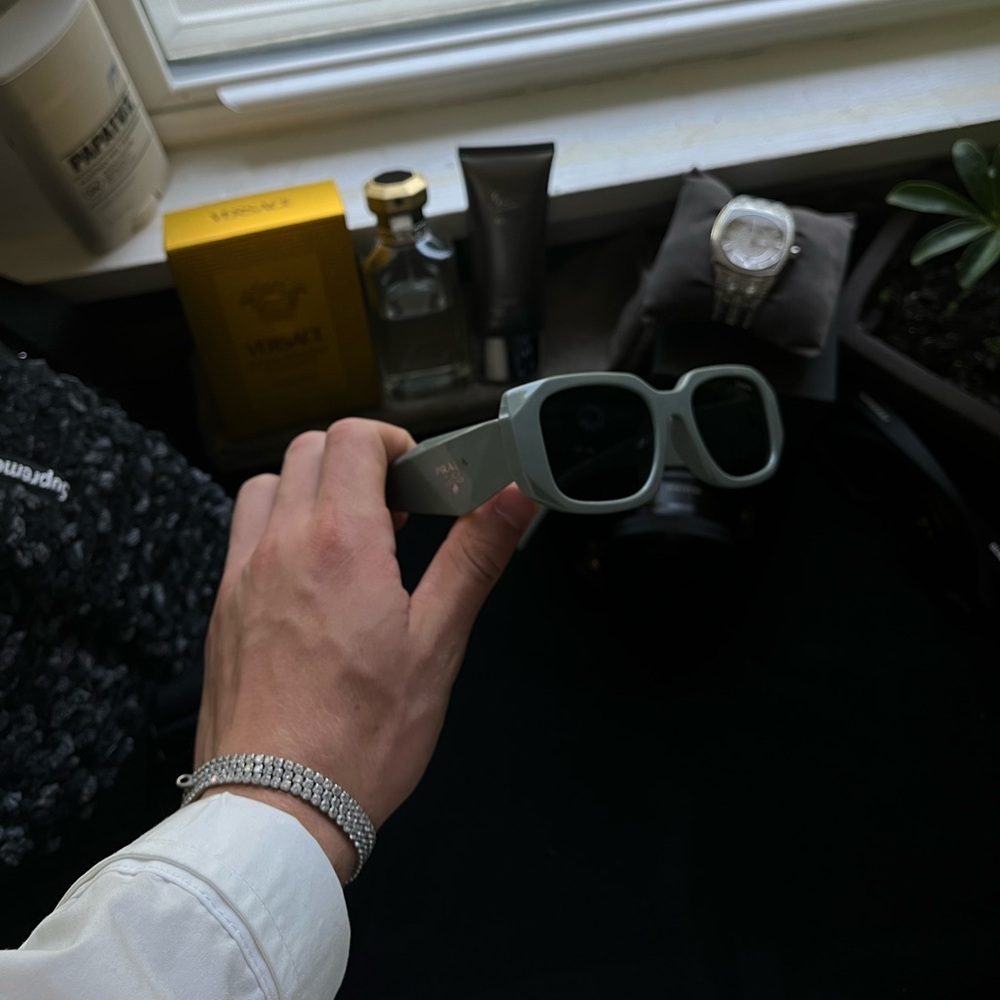 prada symbole sunglasses, personally used lightly and a favorite.